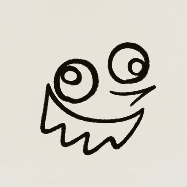 黒い線で描かれた渦巻きの目と大きな口の顔